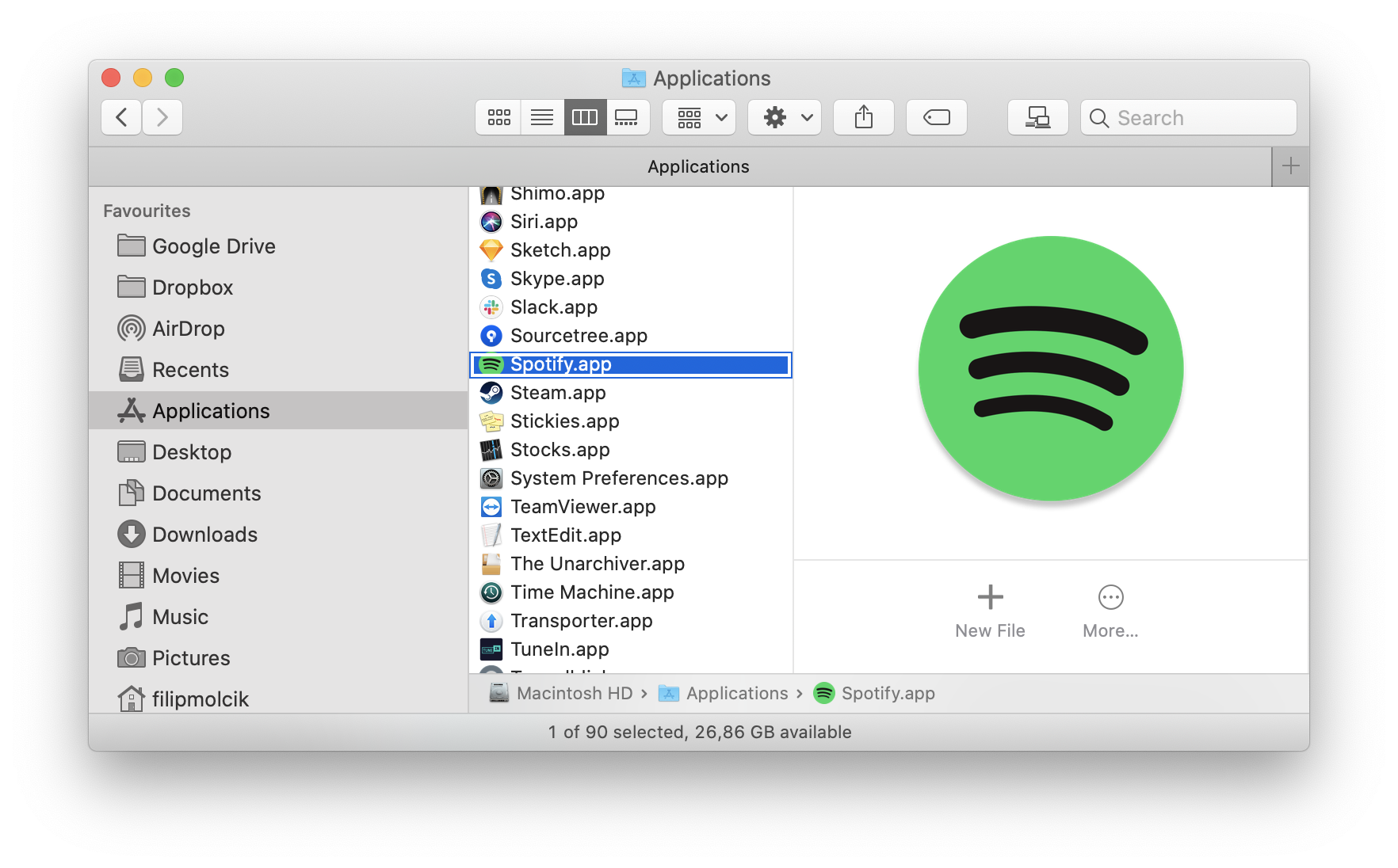 Why does spotify open at login mac